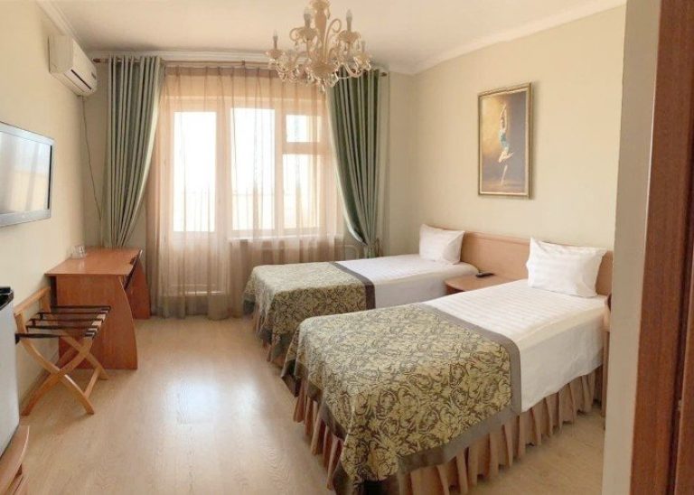 Bravo's standard twin room has two single beds.